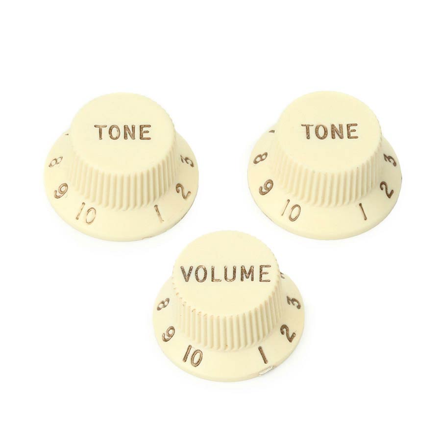 Fender strat knobs, left-handed, 1V + 2T, aged white