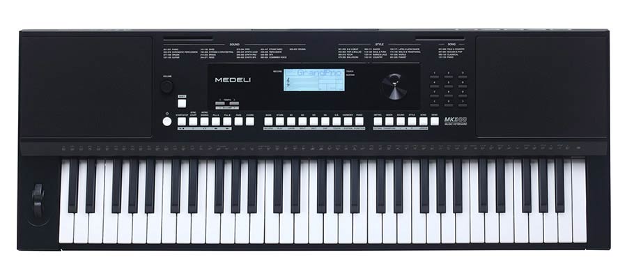 keyboard, 61 touch sensitive keys, backlit LCD, pitch-bend,  2 x 15 W